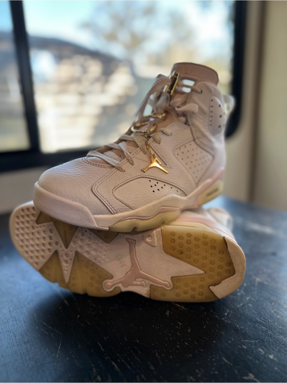 Jordan Women's High-Top Sneakers in Pale Pink with Gold Hardware
